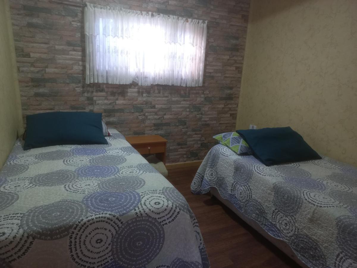 Hostal Don Pedro Puerto Natales Exterior photo